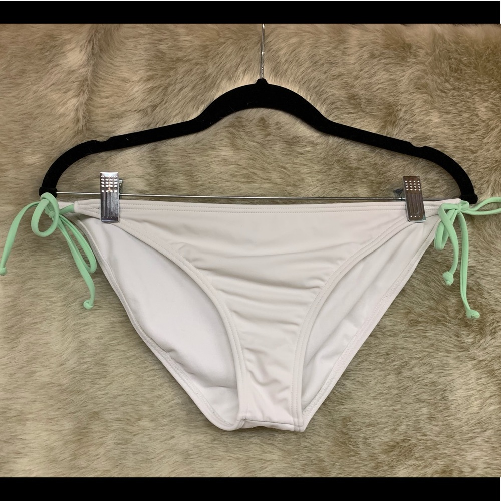 White bathing suit bottom, mint green ties